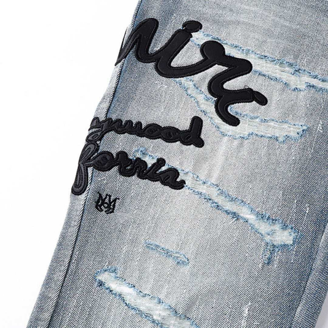 Amr Logo Staggered Jeans